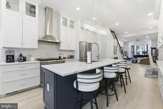 a bedroom with a bed and a desk