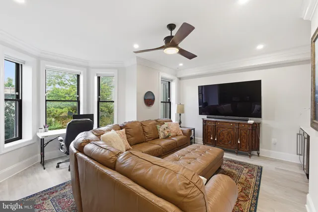 a bathroom with double vanity sink and mirror