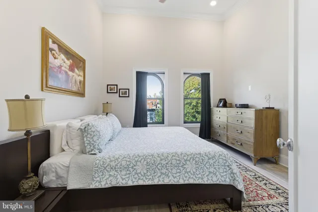 a view of balcony with wooden floor and bench