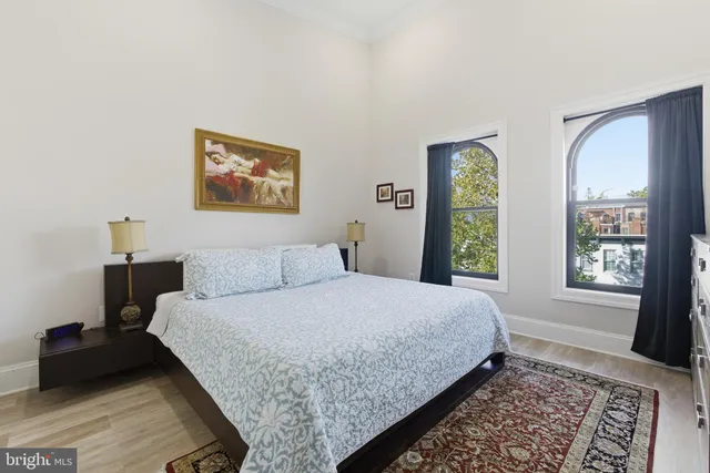 a balcony with table and chairs