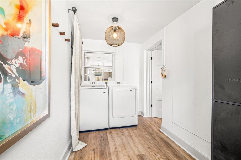 11225 2nd Street East, Unit A Treasure Island, FL 33706 - Photo 18 of 25 a view of kitchen and utility room