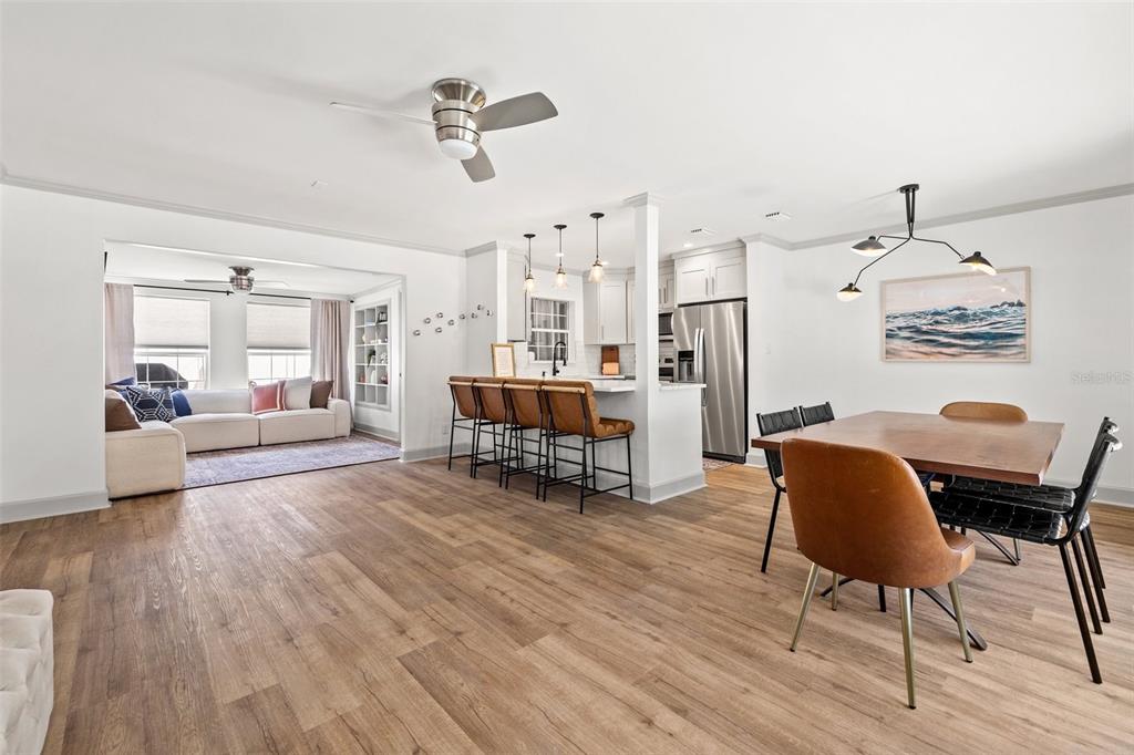 11225 2nd Street East, Unit A Treasure Island, FL 33706 - Photo 3 of 25 a living room with furniture and wooden floor