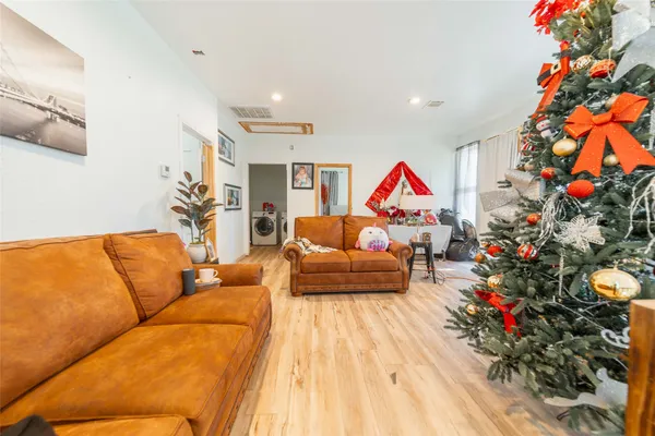a living room with furniture and a couch