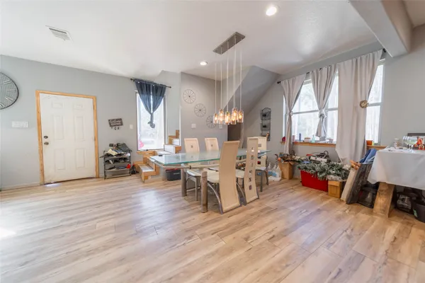 a view of a livingroom with furniture and a livingroom