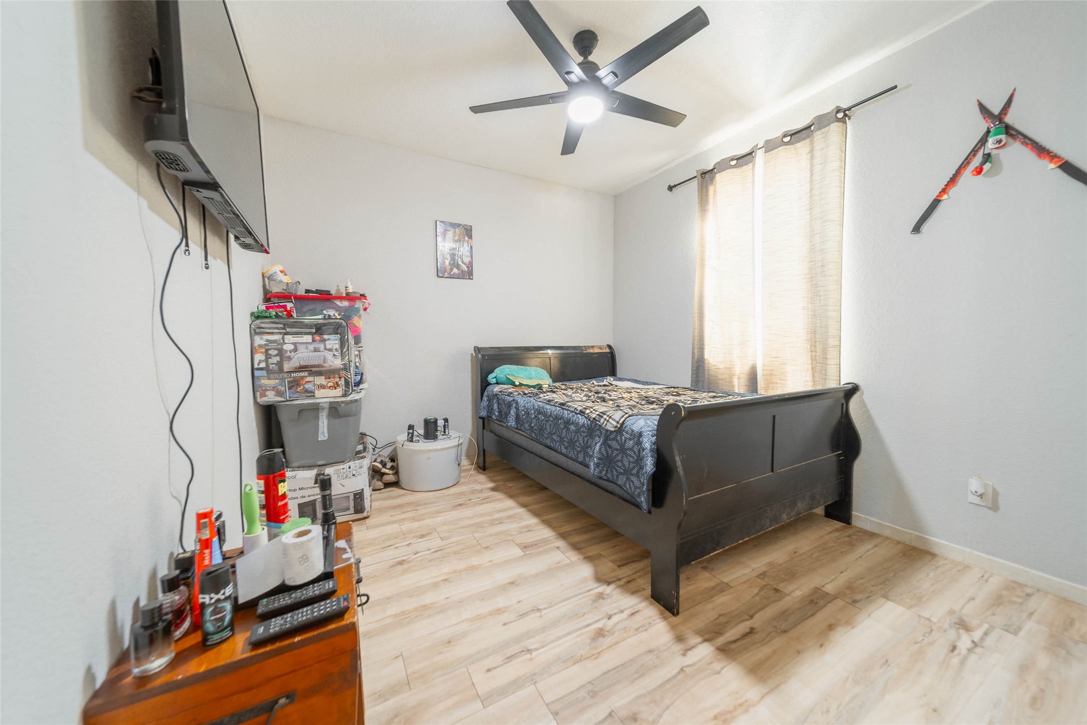 11 Seth Cleveland, TX 77328 - Photo 19 of 50 a living room with furniture and a flat screen tv
