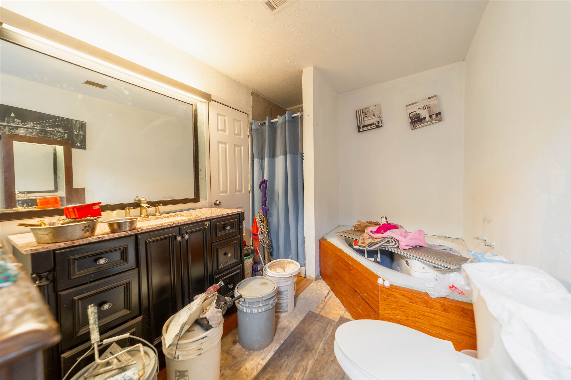 11 Seth Cleveland, TX 77328 - Photo 28 of 50 a bathroom with a tub sink mirror and vanity
