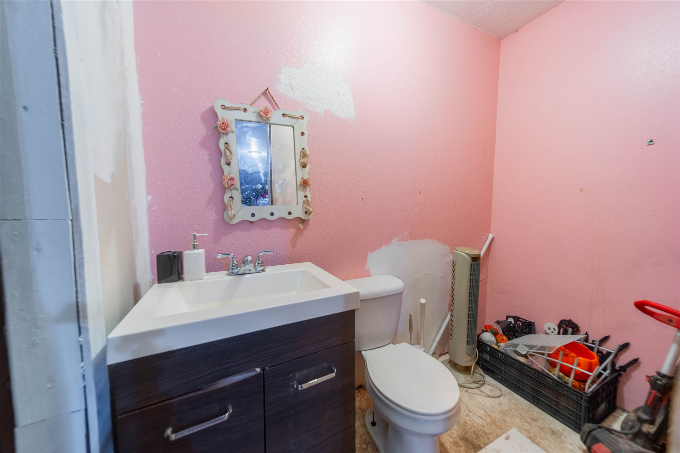 11 Seth Cleveland, TX 77328 - Photo 33 of 50 a bathroom with a sink vanity mirror and toilet