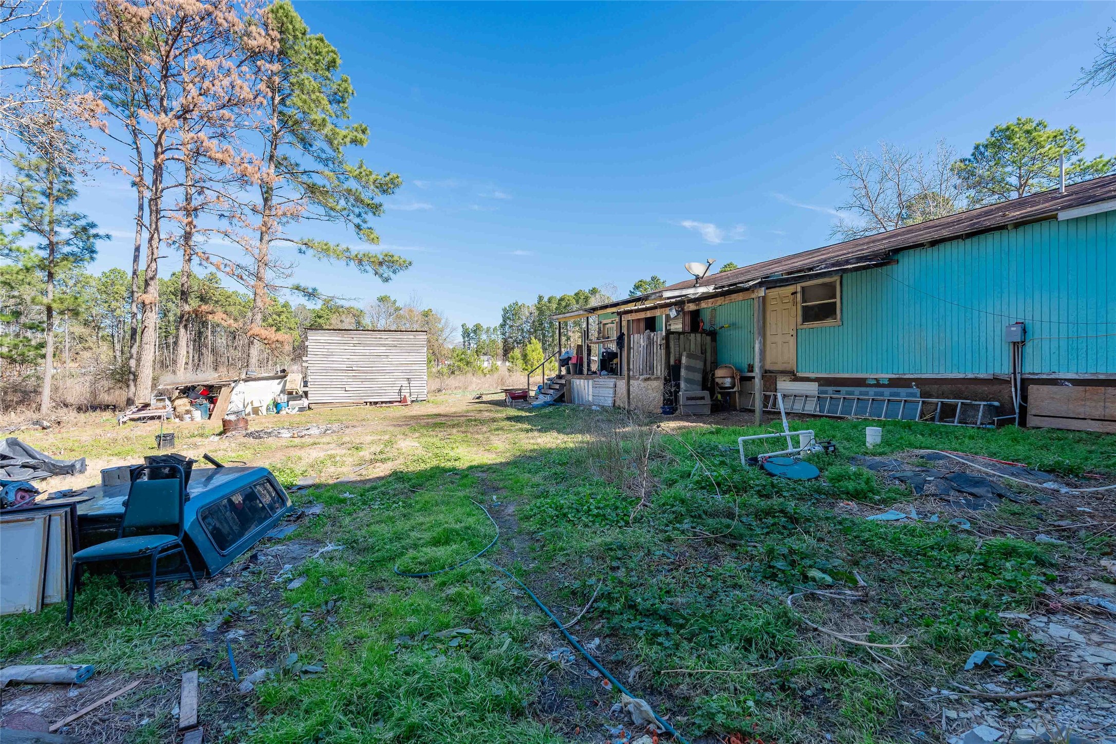 11 Seth Cleveland, TX 77328 - Photo 38 of 50 a view of backyard of house with outdoor seating and green space