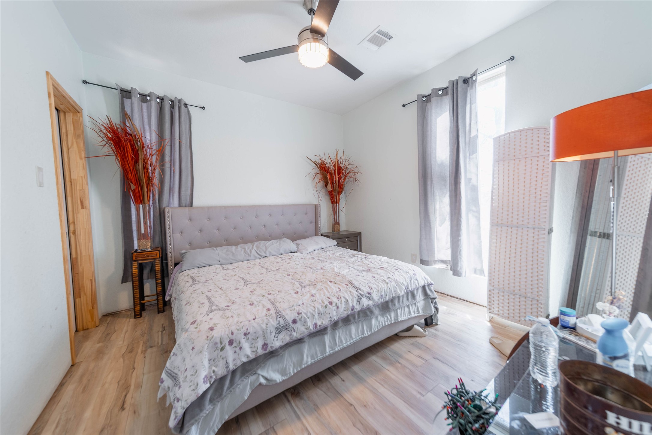 11 Seth Cleveland, TX 77328 - Photo 4 of 50 a bedroom with bed and a chandelier