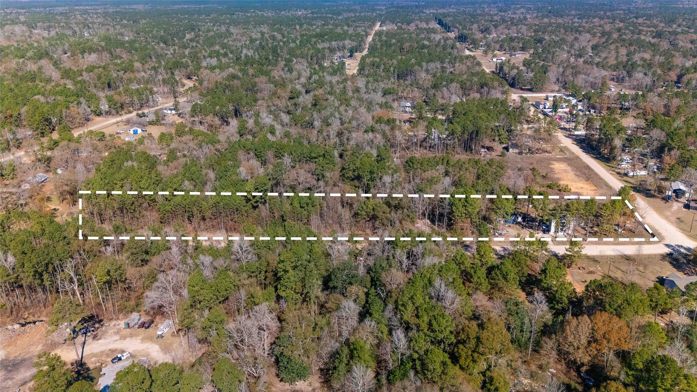 11 Seth Cleveland, TX 77328 - Photo 49 of 50 an aerial view of residential houses with outdoor space and trees