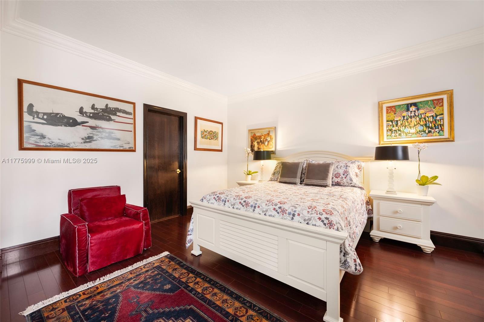 3707 Northeast 214th Street, Unit 14 Aventura, FL 33180 - Photo 13 of 47 a bedroom with a bed and a couch