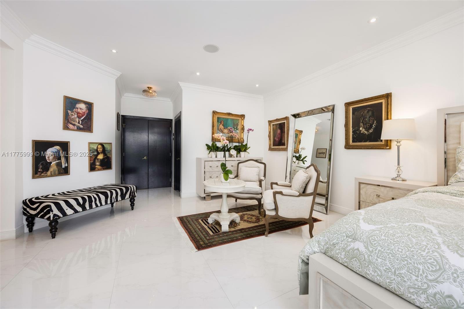 3707 Northeast 214th Street, Unit 14 Aventura, FL 33180 - Photo 14 of 47 a living room with furniture and a flat screen tv