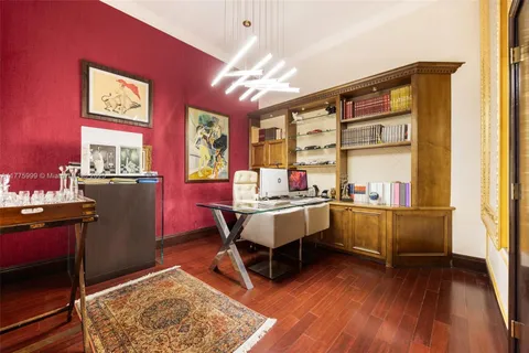 a view of a living room and dining room