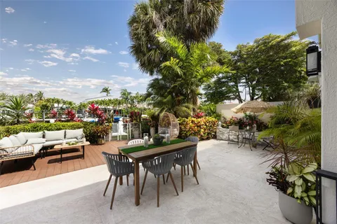 a view of a backyard with a patio