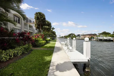 a view of swimming pool with outdoor seating