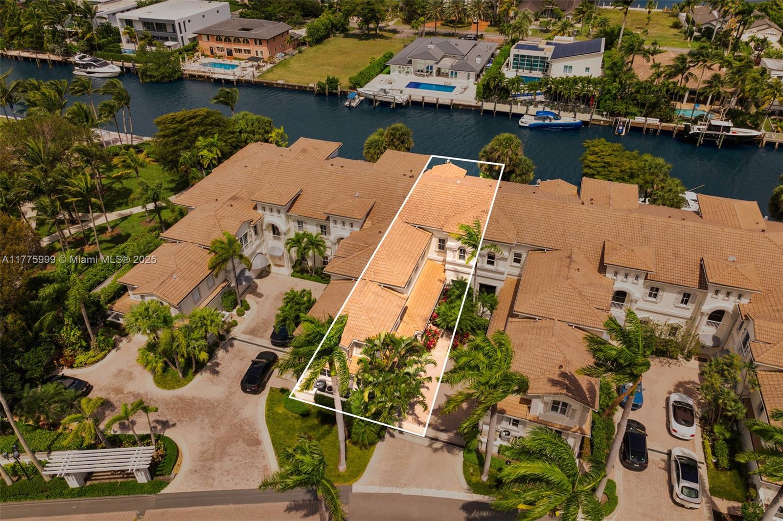 3707 Northeast 214th Street, Unit 14 Aventura, FL 33180 - Photo 39 of 47 an aerial view of a house with a lake view