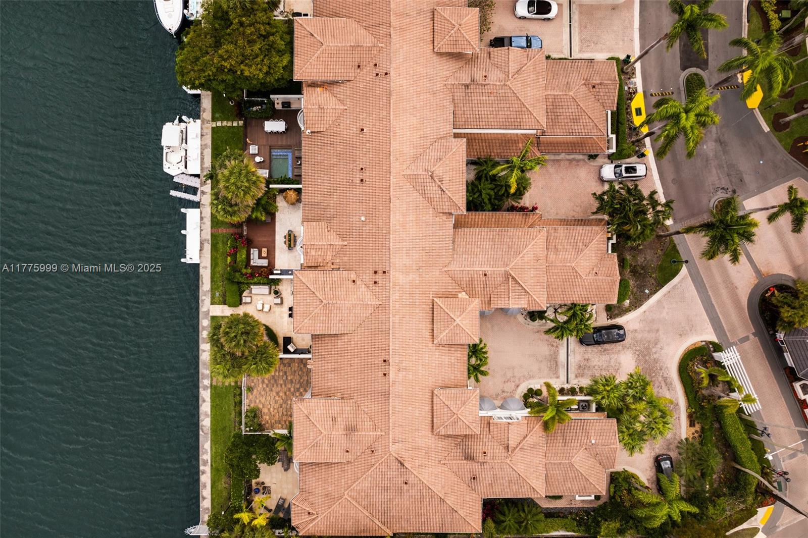 3707 Northeast 214th Street, Unit 14 Aventura, FL 33180 - Photo 40 of 47 an aerial view of residential houses with outdoor space
