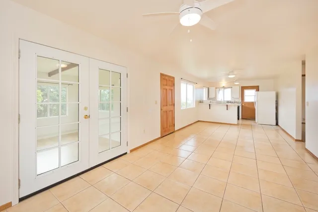 a view of a hallway with windows