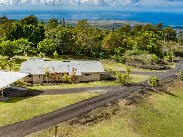 a view of a house with a garden