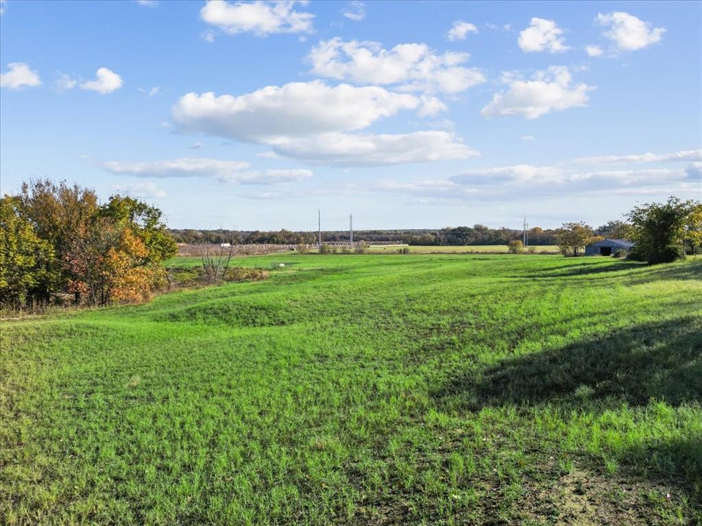 8123 Hilltop Road Argyle, TX 76226 - Photo 13 of 34 a view of a green field with lots of green space