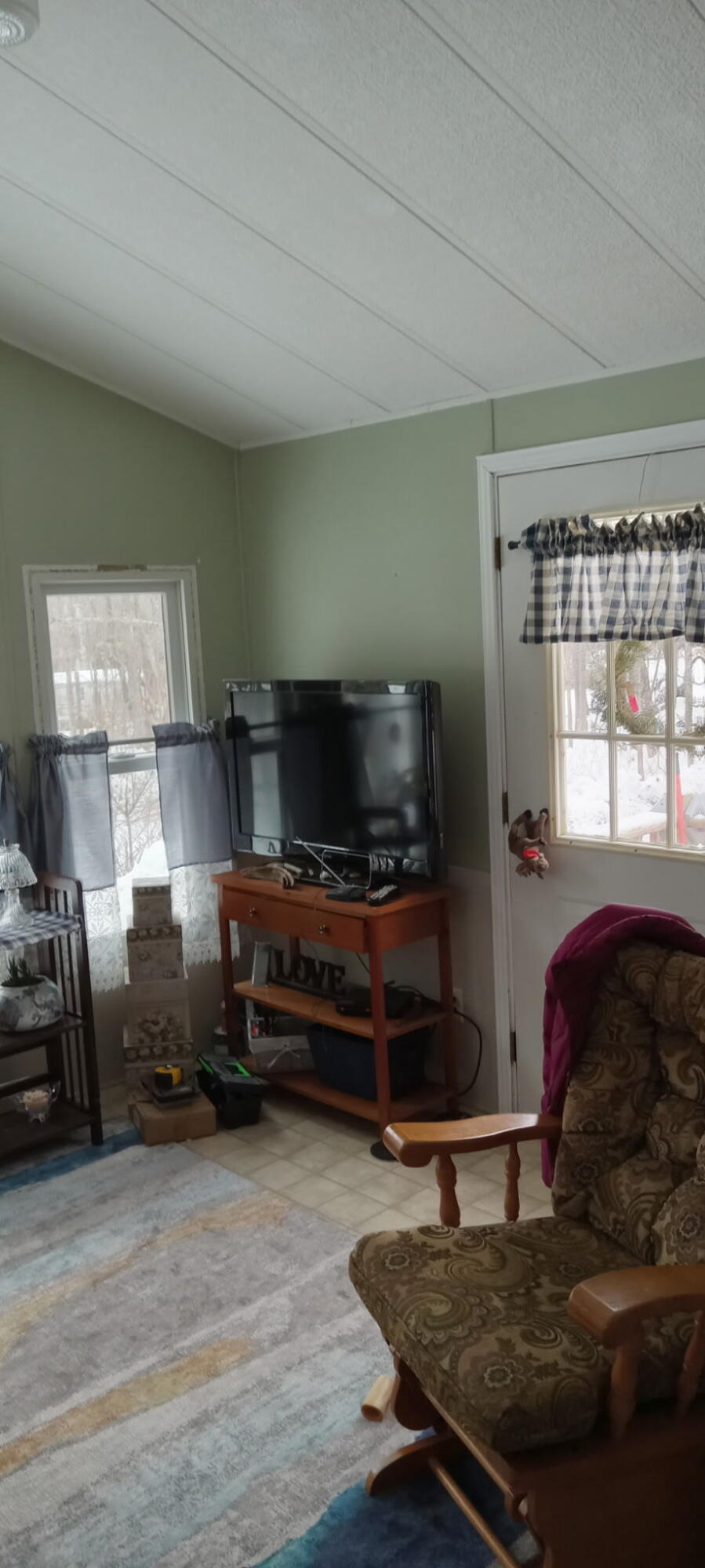 108 Green Road Fairfield, ME 04937 - Photo 10 of 17 0424 living room area before propane sto