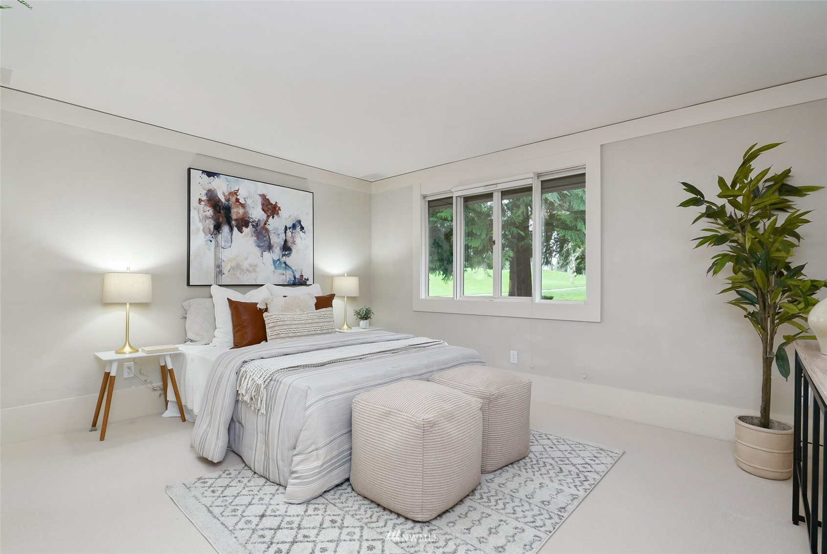 2315 216th Place Northeast Sammamish, WA 98074 - Photo 23 of 38 a bed room with a bed and a painting on the wall