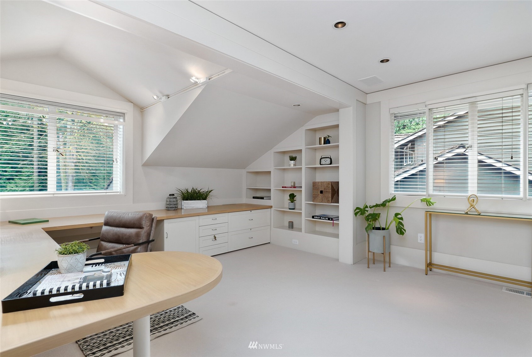 2315 216th Place Northeast Sammamish, WA 98074 - Photo 24 of 38 a large living room with furniture and windows