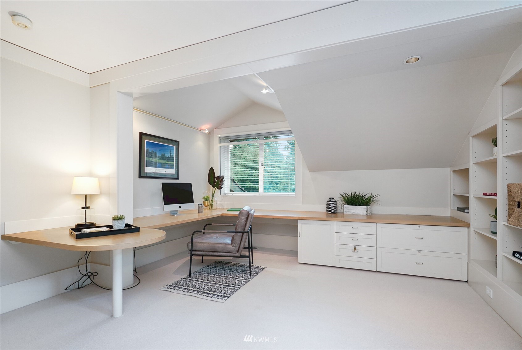 2315 216th Place Northeast Sammamish, WA 98074 - Photo 25 of 38 a living room with furniture and a window