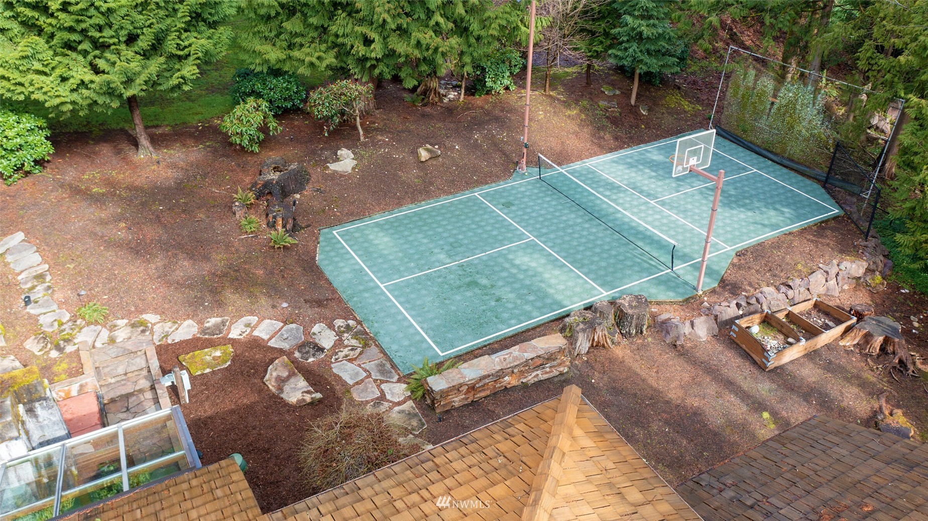 2315 216th Place Northeast Sammamish, WA 98074 - Photo 36 of 38 a view of a tennis ground with large trees