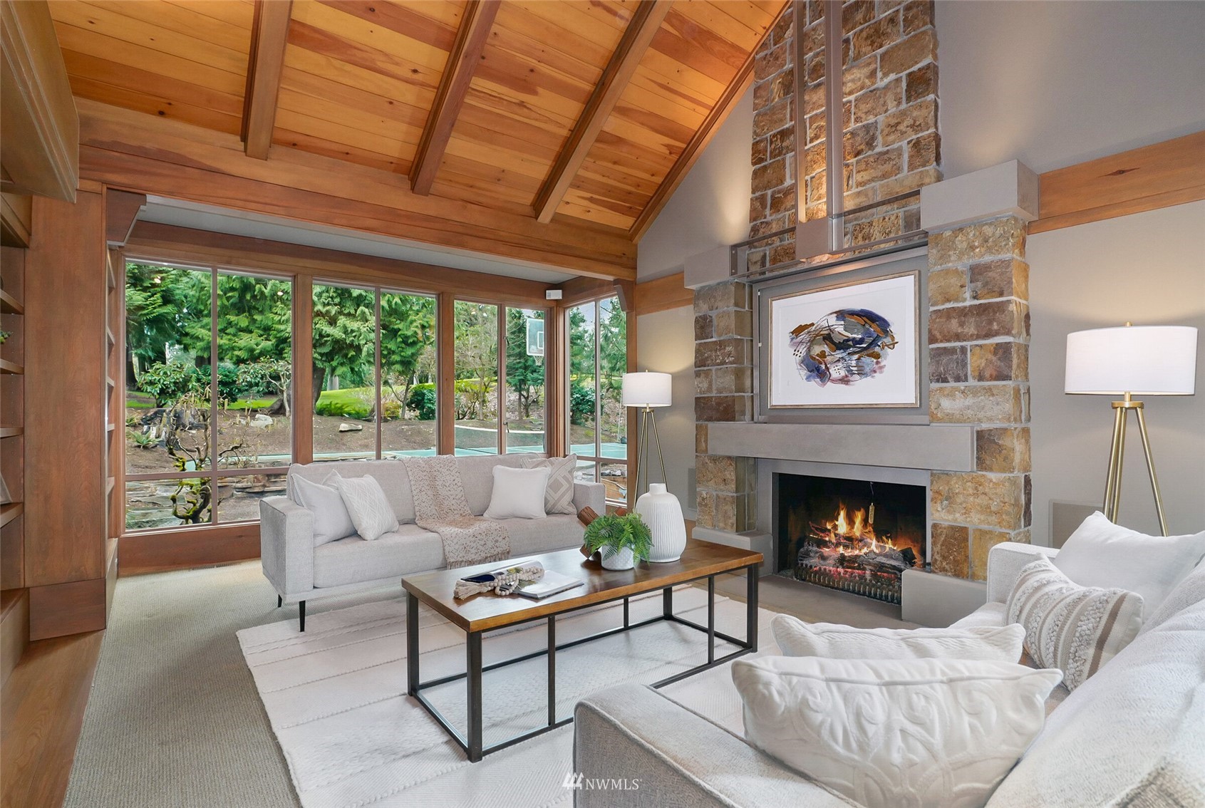 2315 216th Place Northeast Sammamish, WA 98074 - Photo 5 of 38 a living room with furniture and a fireplace