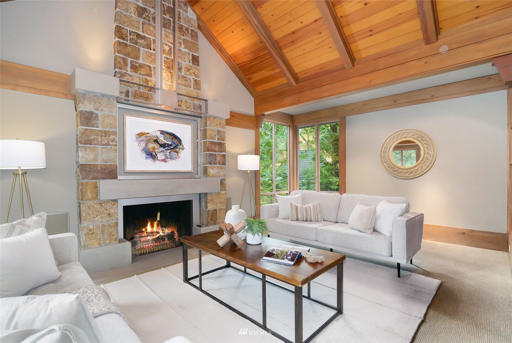2315 216th Place Northeast Sammamish, WA 98074 - Photo 6 of 38 a living room with furniture and a fireplace