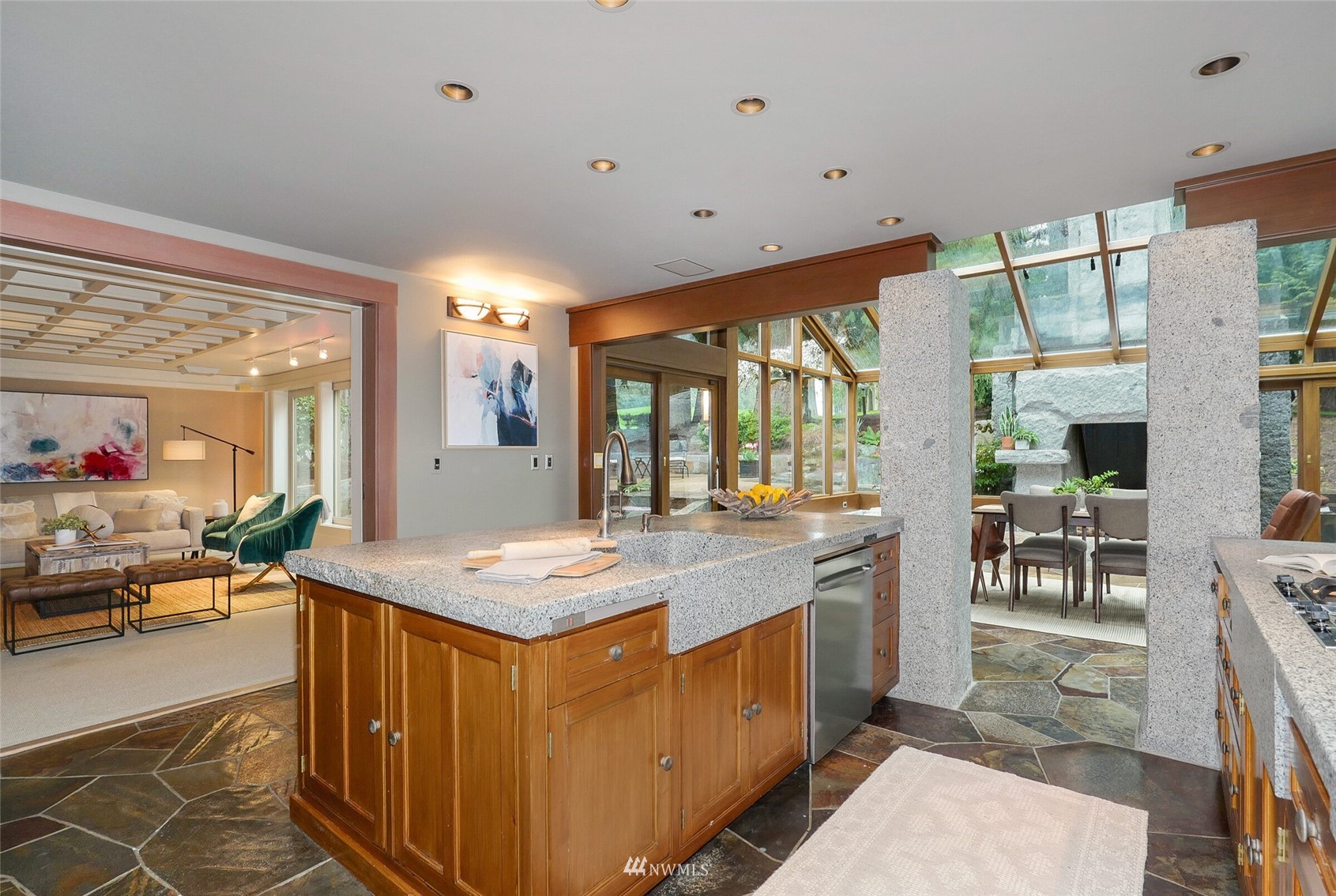 2315 216th Place Northeast Sammamish, WA 98074 - Photo 9 of 38 a dining hall with stainless steel appliances granite countertop a granite counter tops and a view of living room