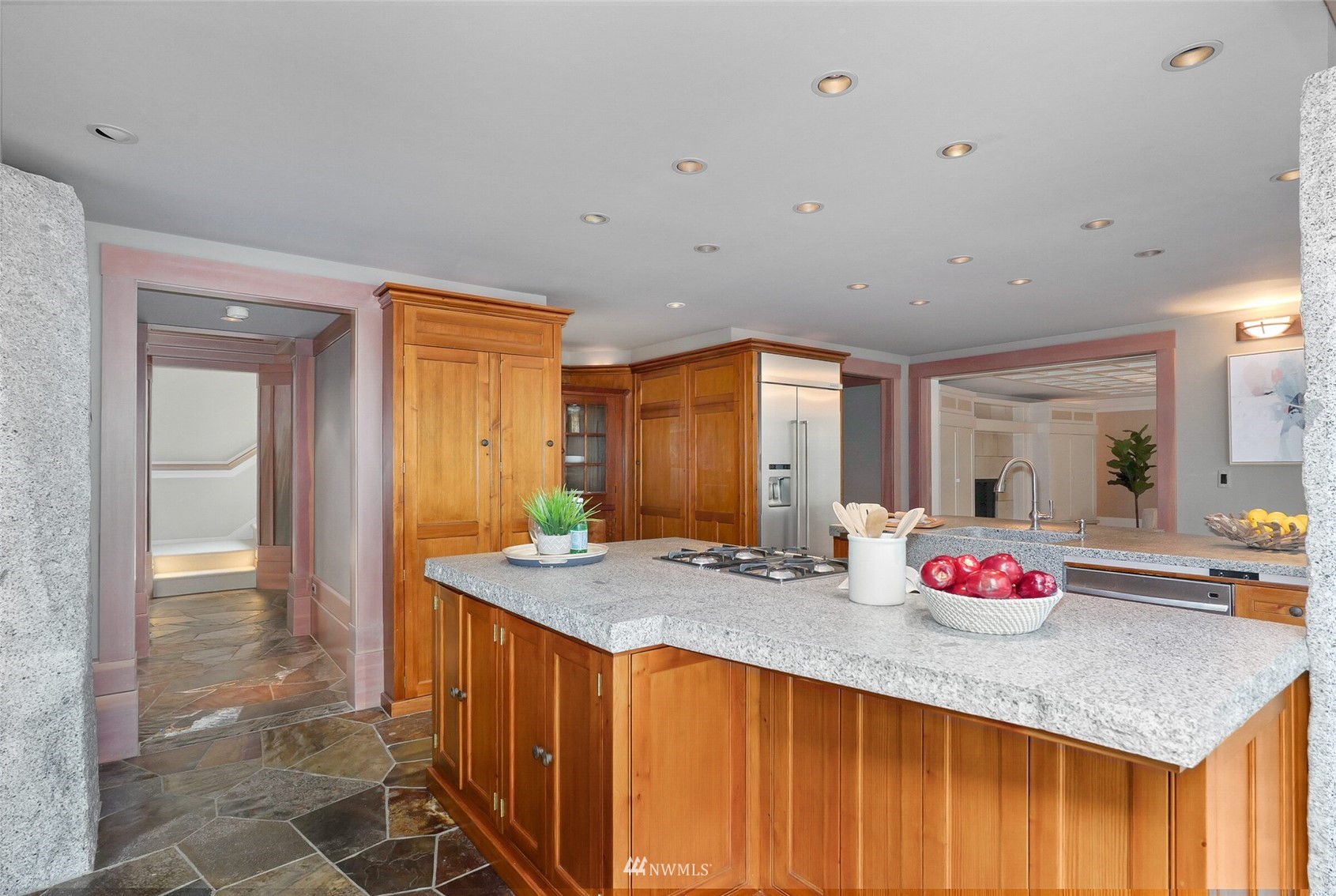 2315 216th Place Northeast Sammamish, WA 98074 - Photo 10 of 38 a kitchen with granite countertop sink and cabinets