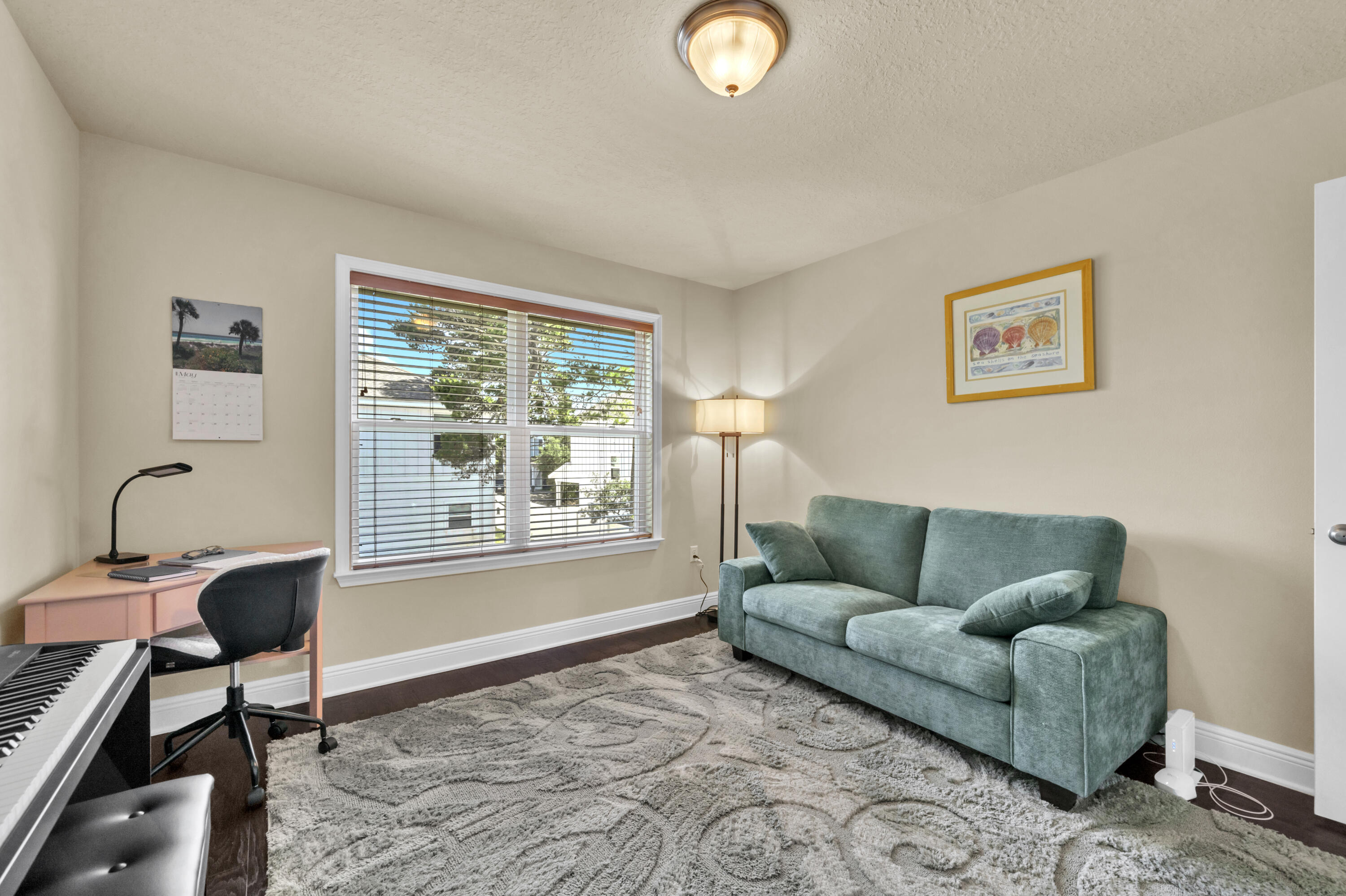 19 Topside Drive Inlet Beach, FL 32461 - Photo 16 of 28 a living room with furniture and a window