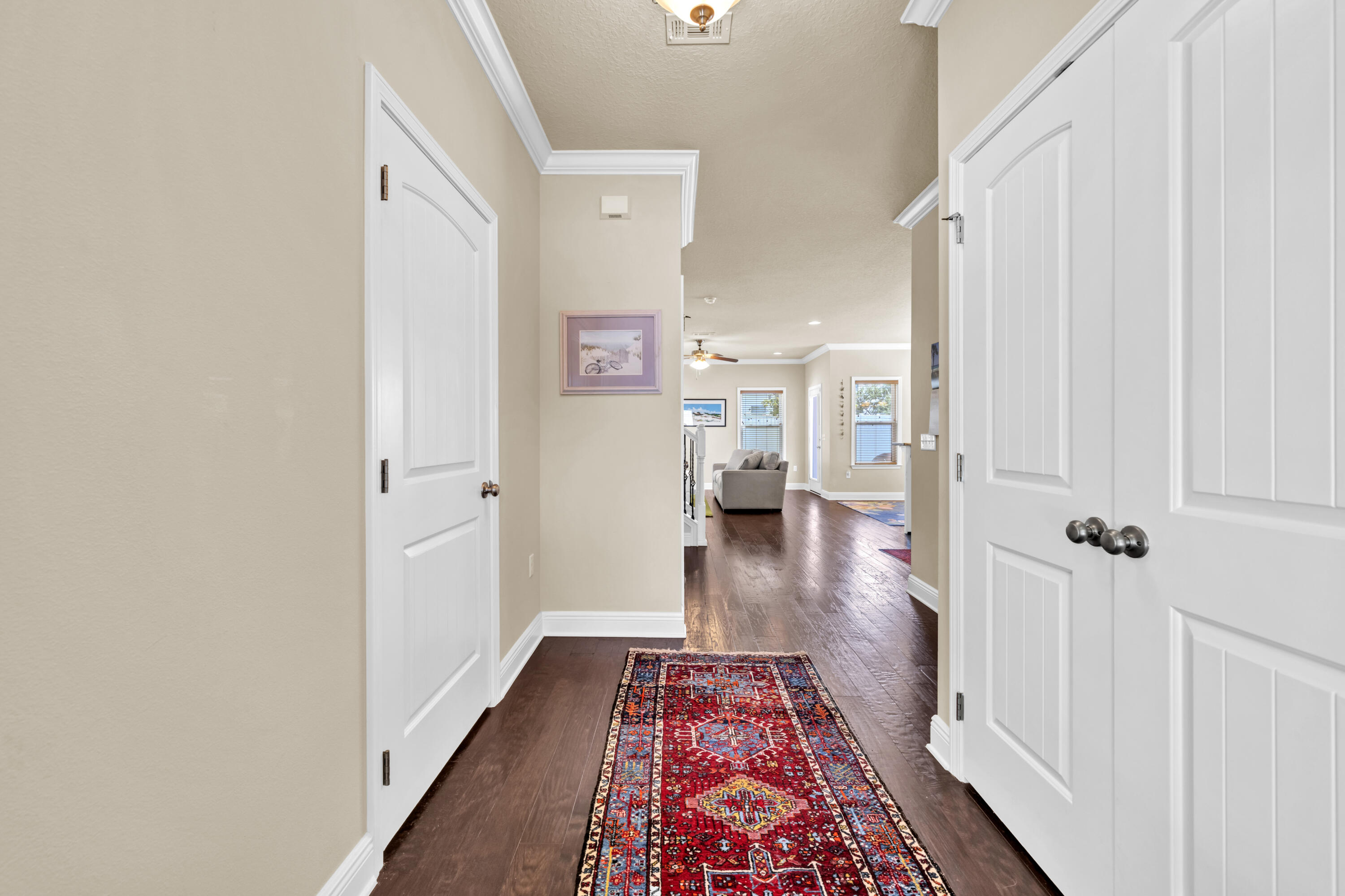 19 Topside Drive Inlet Beach, FL 32461 - Photo 2 of 28 a view of a hallway with wooden floor and a bathroom