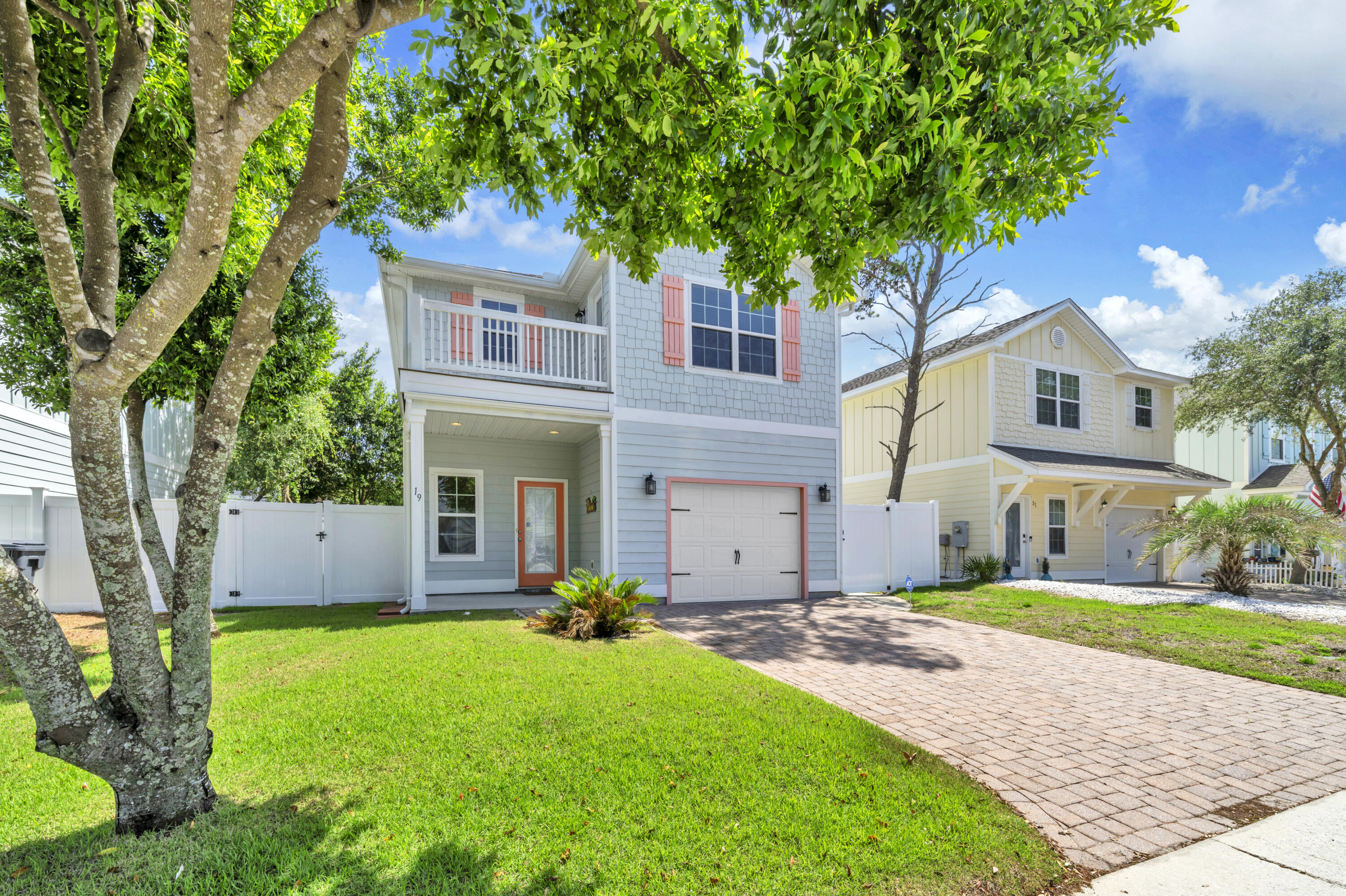 19 Topside Drive Inlet Beach, FL 32461 - Photo 28 of 28 a front view of a house with a garden and yard
