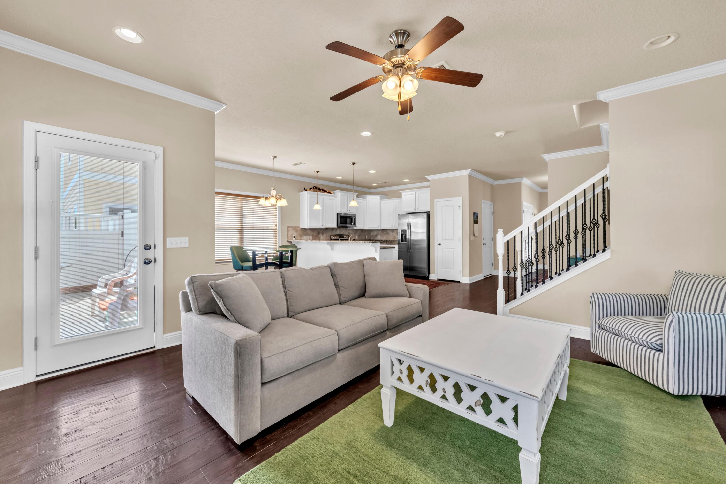 19 Topside Drive Inlet Beach, FL 32461 - Photo 8 of 28 a living room with furniture and a chandelier