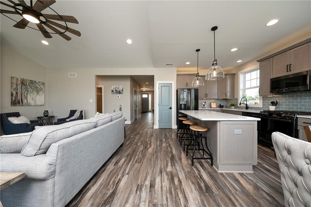 103 Ridge Line Drive Apollo, PA 15613 - Photo 17 of 39 a large white kitchen with a large window appliances and cabinets