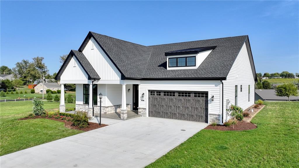 103 Ridge Line Drive Apollo, PA 15613 - Photo 2 of 39 a front view of a house with yard and green space