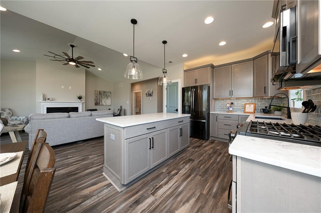 103 Ridge Line Drive Apollo, PA 15613 - Photo 22 of 39 a kitchen with white cabinets and stainless steel appliances