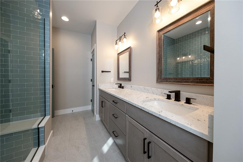 103 Ridge Line Drive Apollo, PA 15613 - Photo 30 of 39 a bathroom with a double vanity sink and a mirror