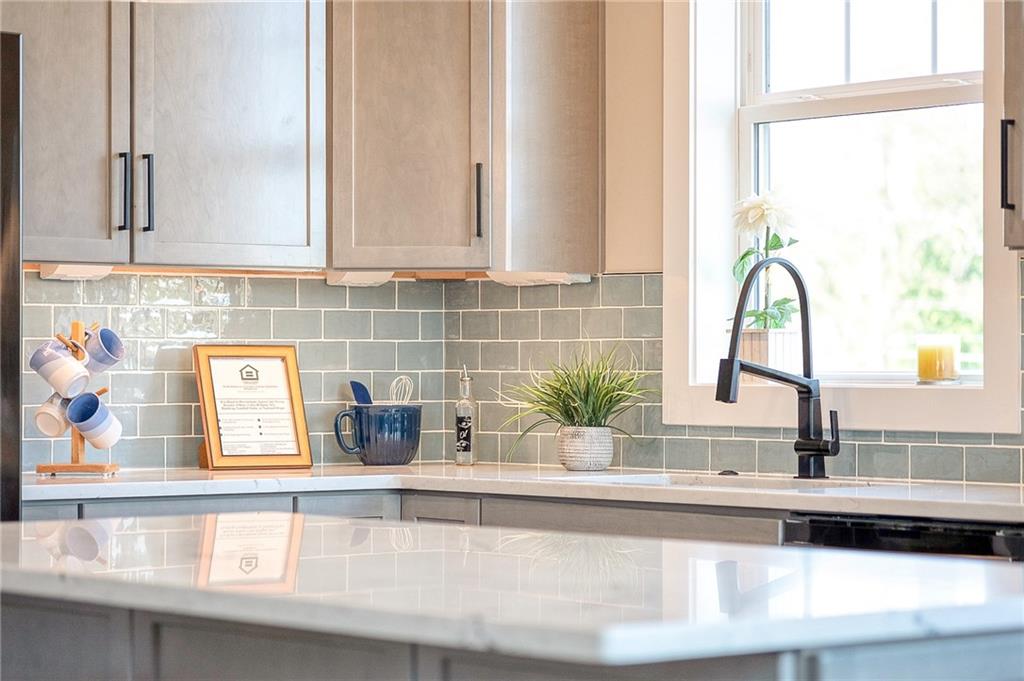 103 Ridge Line Drive Apollo, PA 15613 - Photo 34 of 39 a kitchen with granite countertop a sink and a window