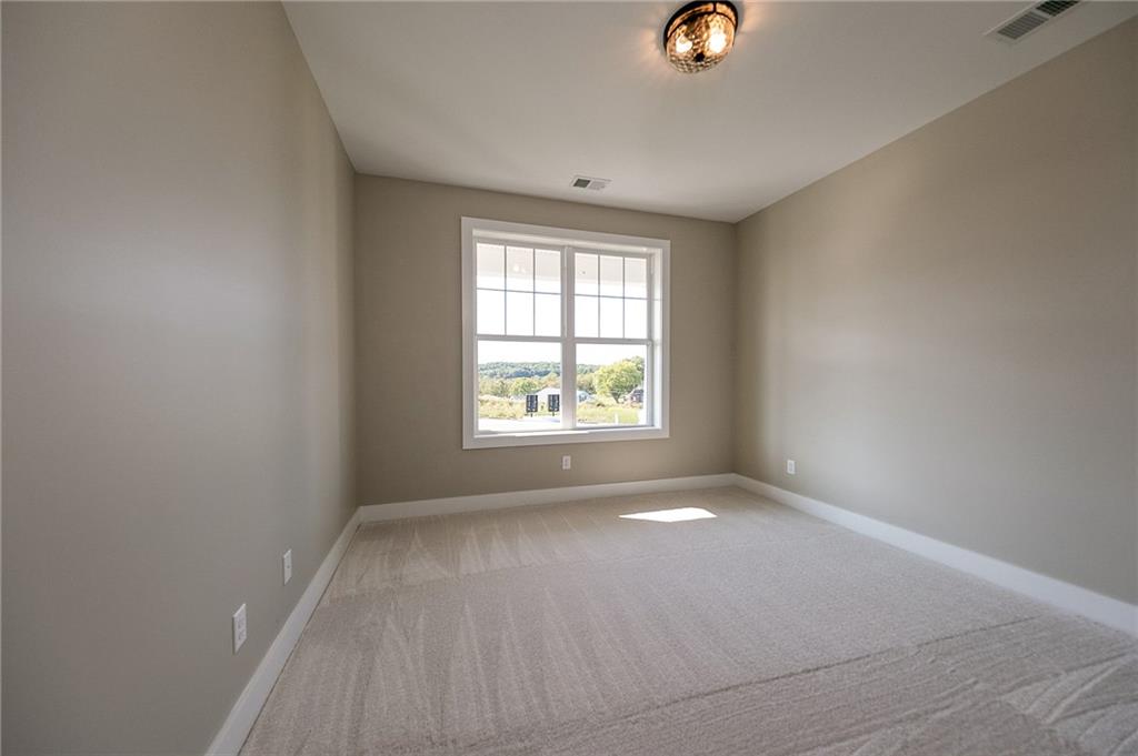 103 Ridge Line Drive Apollo, PA 15613 - Photo 9 of 39 an empty room with windows