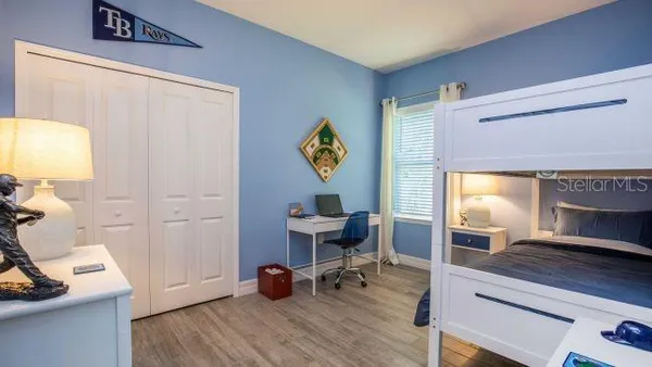 a workspace with furniture and a window