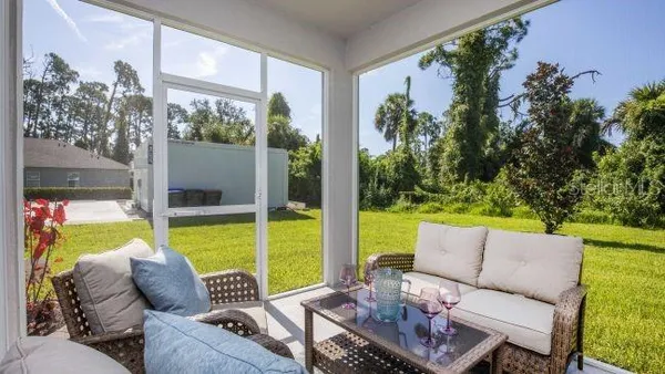 a view of deck with patio and backyard