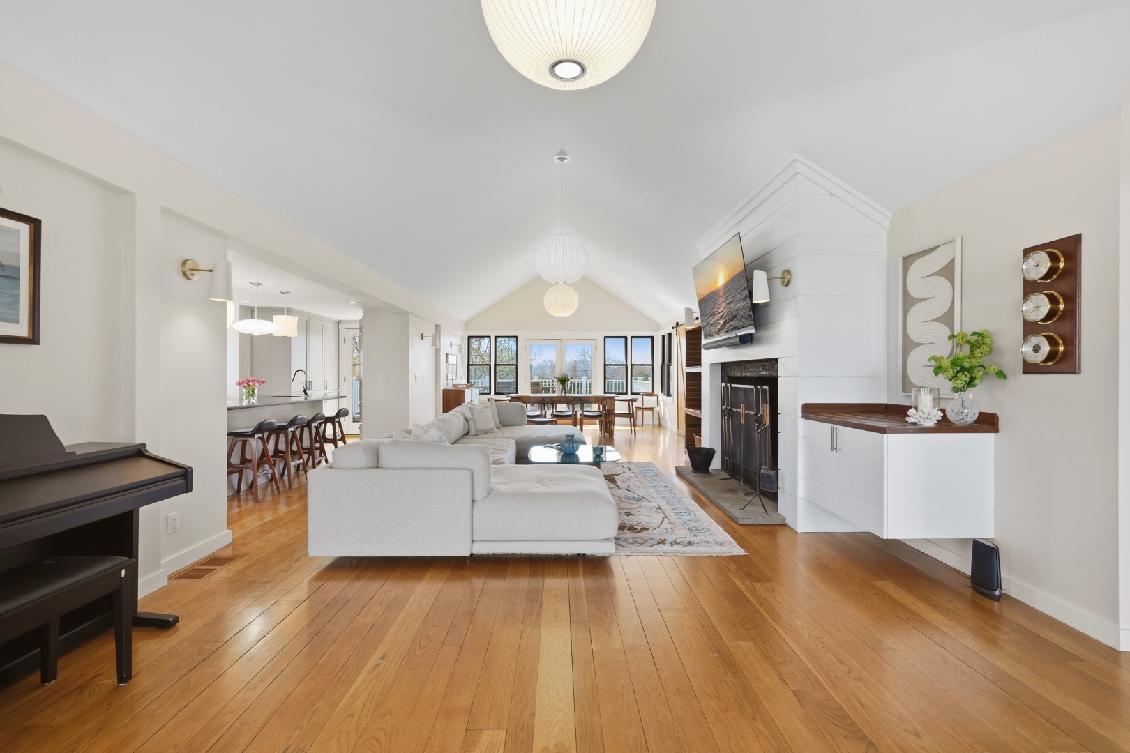 247 Polpis Road Nantucket, MA 02554 - Photo 12 of 52 a living room with furniture and a wooden floor