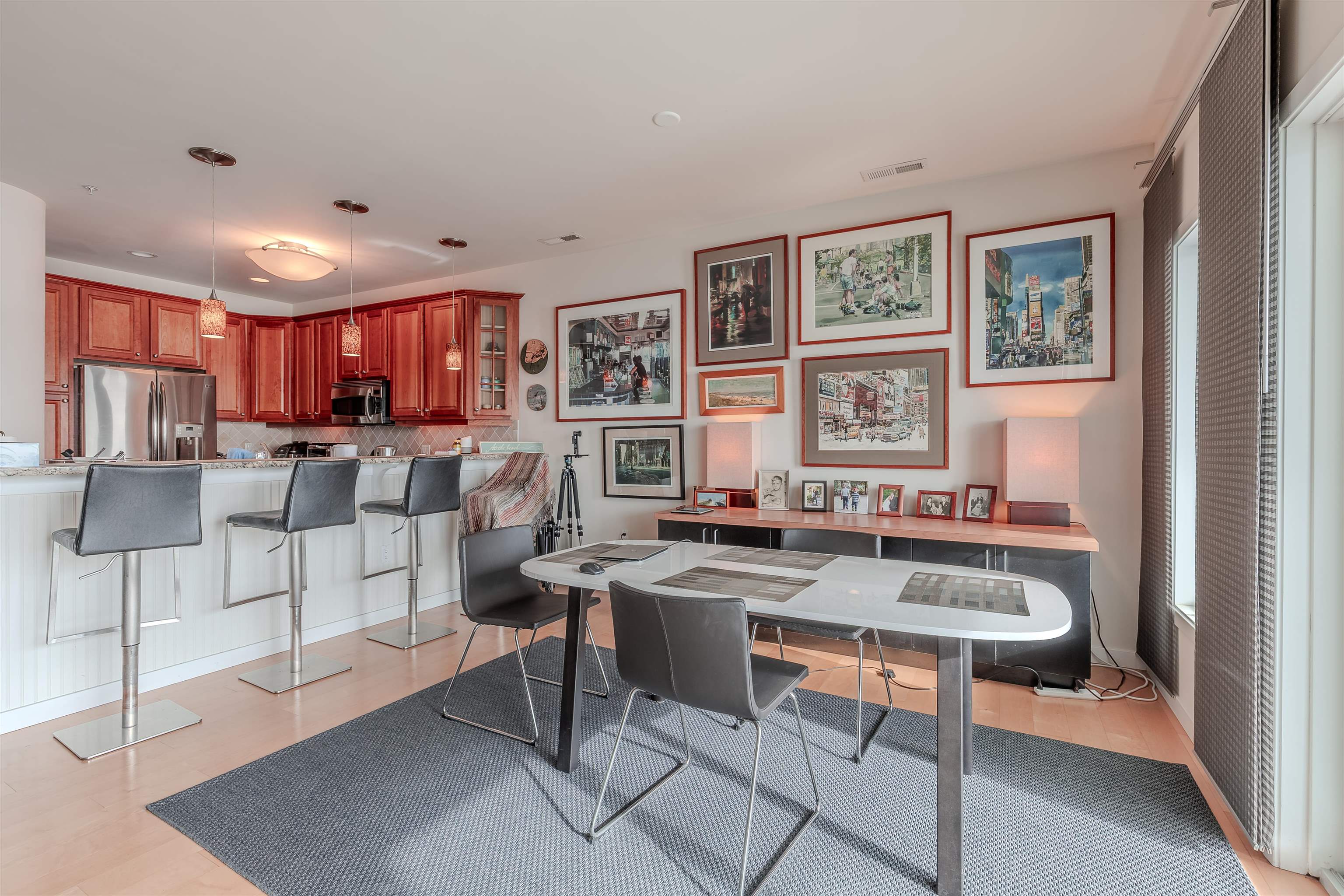 902 Ocean, Unit 106 Cape May, NJ 08204 - Photo 12 of 33 a view of a dining room kitchen and livingroom