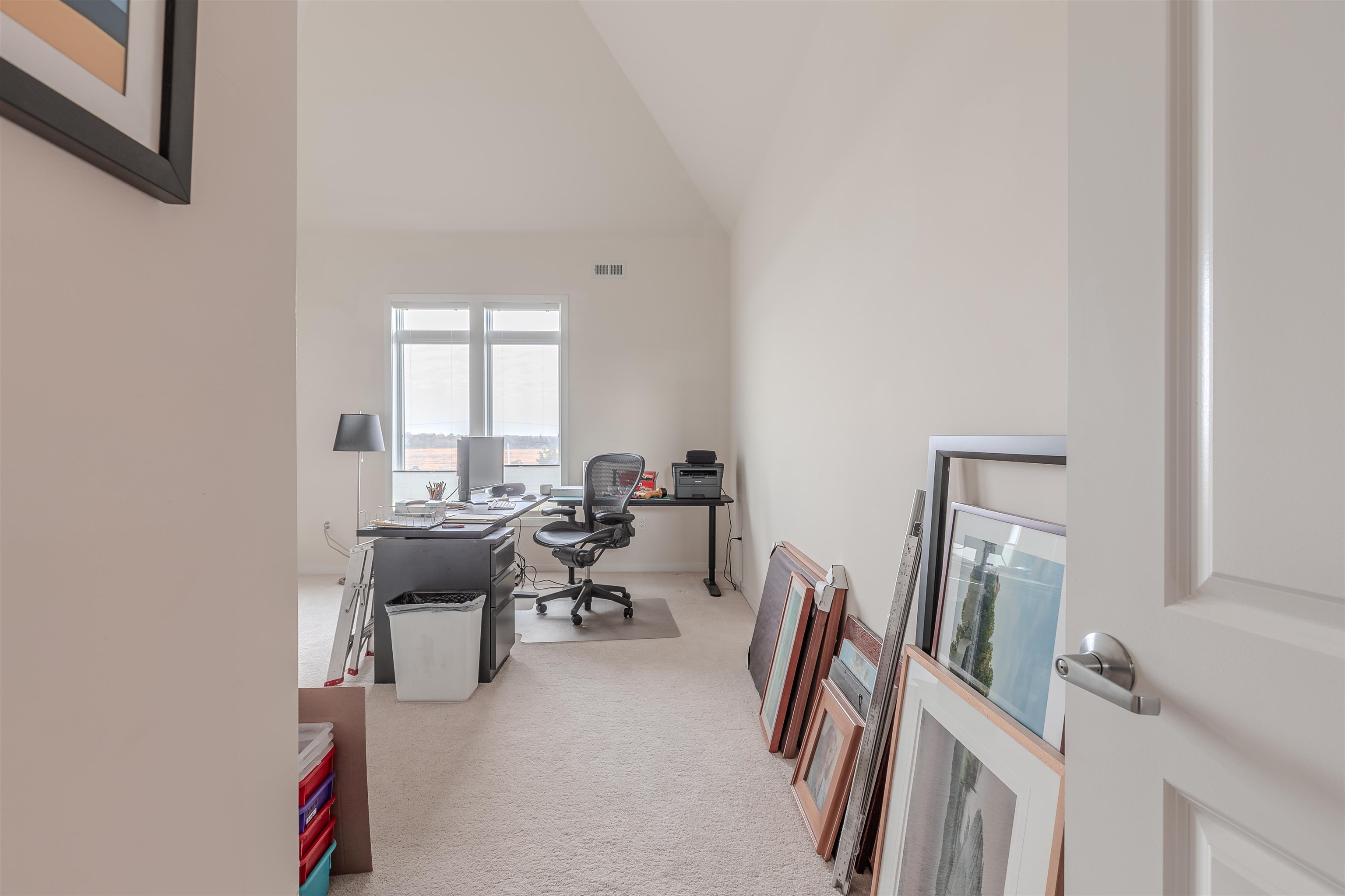 902 Ocean, Unit 106 Cape May, NJ 08204 - Photo 15 of 33 a living room with furniture a rug and a window
