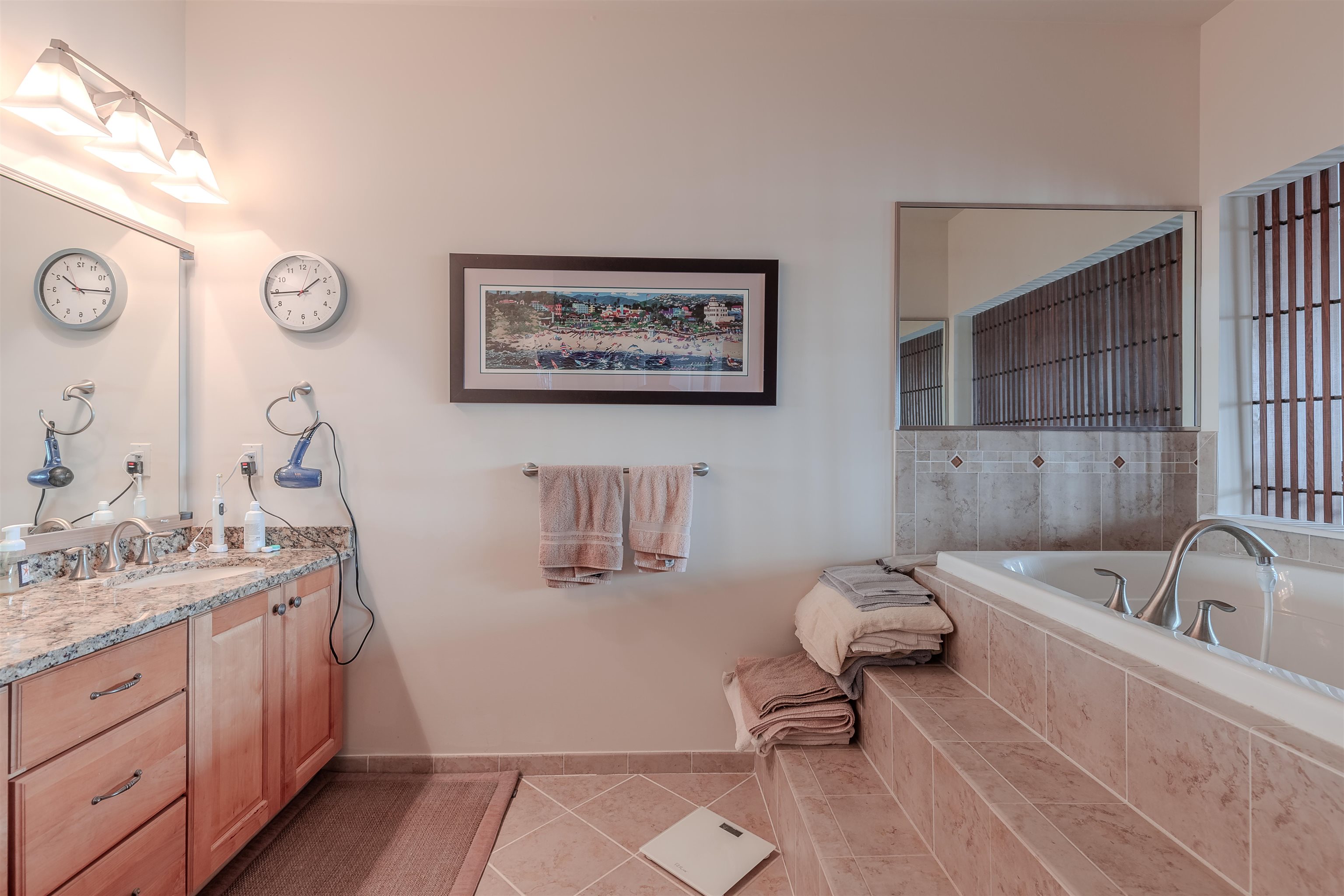 902 Ocean, Unit 106 Cape May, NJ 08204 - Photo 23 of 33 a bathroom with a tub sink and mirror