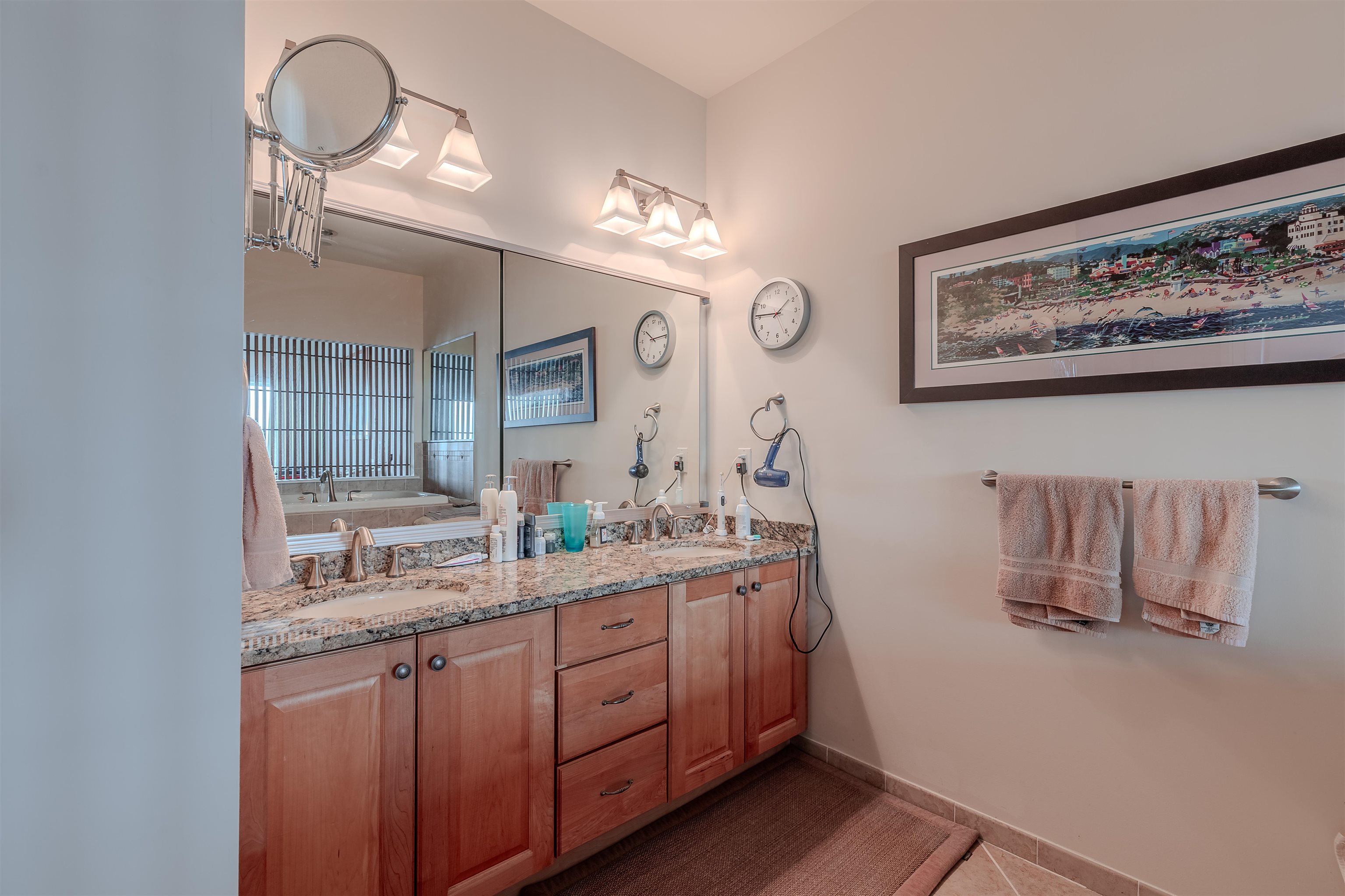 902 Ocean, Unit 106 Cape May, NJ 08204 - Photo 24 of 33 a bathroom with a sink and a mirror